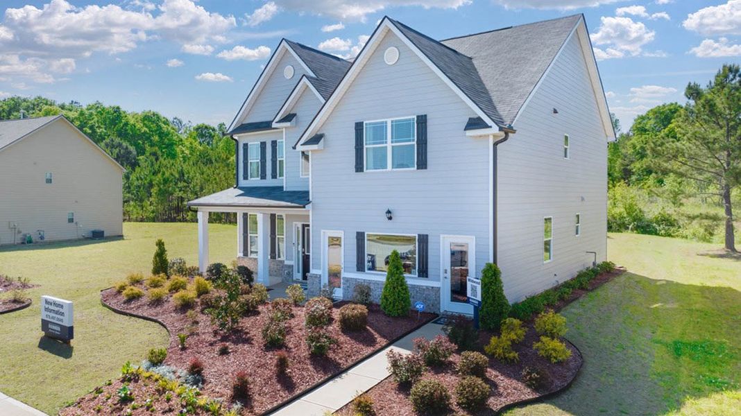 Representative exterior photo of a completed home built from the Fleetwood by D.R. Horton in Evergreen Crossing, Locust Grove, GA (Image 19).