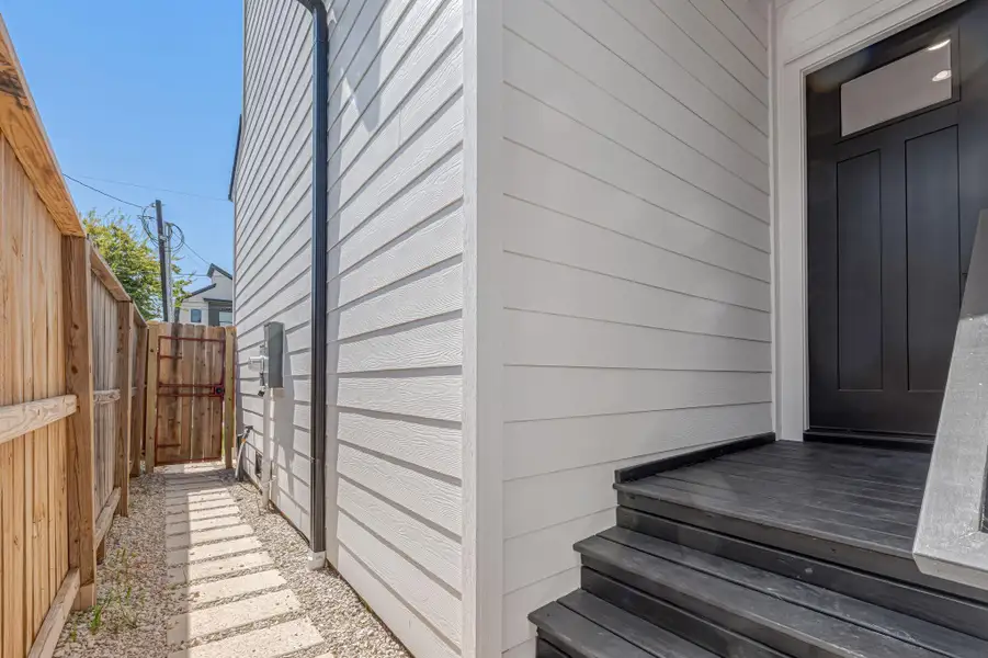 Exterior details and patio area of a home in , Houston (Image 2).