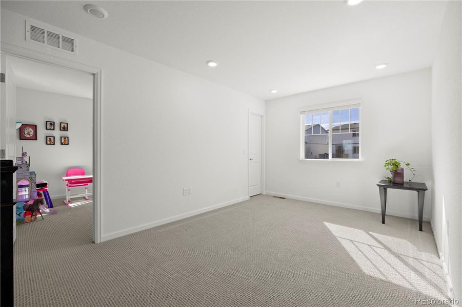 Spacious, unfurnished interior of a new home in Anthology North, Parker (Image 21).