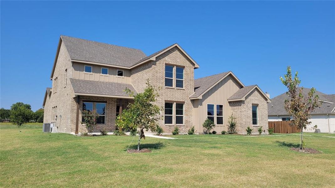 Front exterior of a new home in , Red Oak, TX, highlighting curb appeal (Image 1). Front exterior of a new home in , Red Oak, TX, highlighting curb appeal (Image 1).