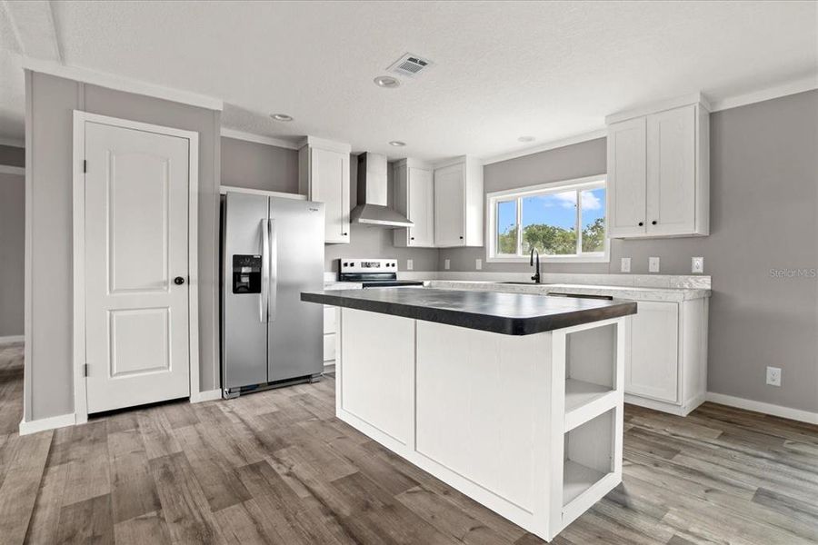 Furnished interior view inside a new home in , Okeechobee (Image 5).