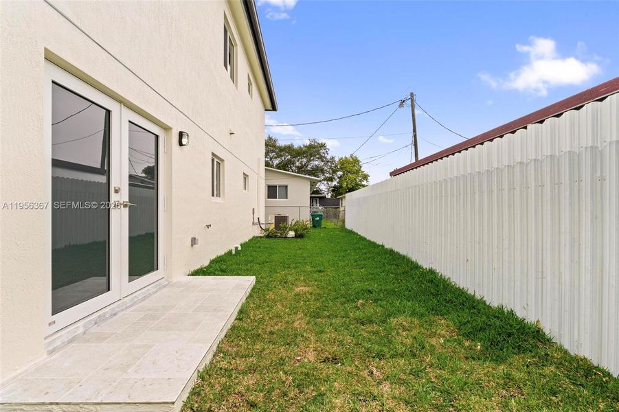 Exterior details and patio area of a home in , Miami (Image 21). Exterior details and patio area of a home in , Miami (Image 21).