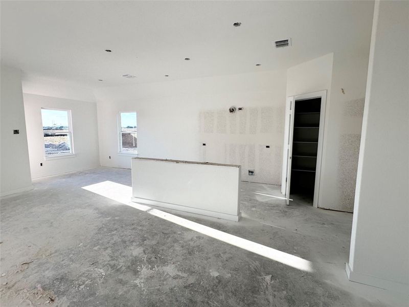 Empty room featuring baseboards