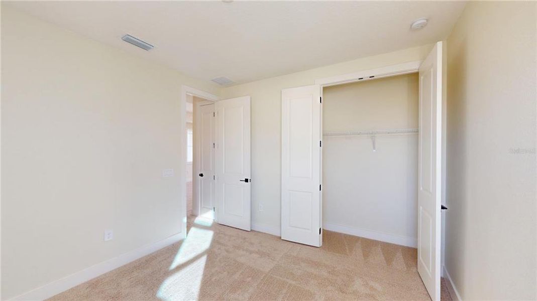 Spacious, unfurnished interior of a new home in Laureate Park, Orlando (Image 27).