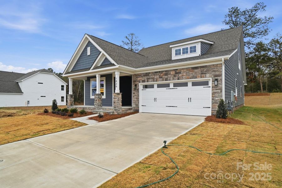 Front exterior of a new home in Waterford Commons, Rock Hill, SC, highlighting curb appeal (Image 2). Front exterior of a new home in Waterford Commons, Rock Hill, SC, highlighting curb appeal (Image 2).