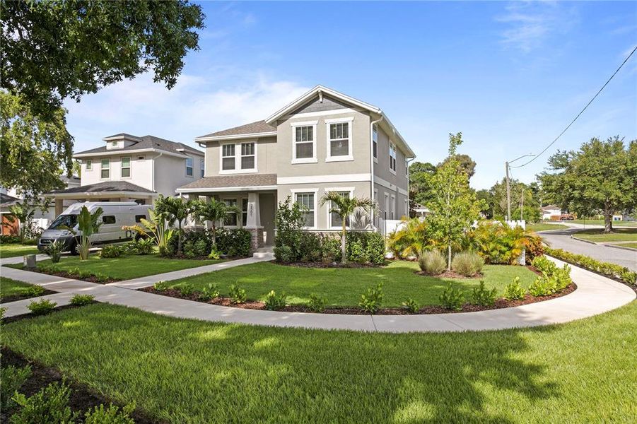 Front exterior of a new home in , St. Petersburg, FL, highlighting curb appeal (Image 27).
