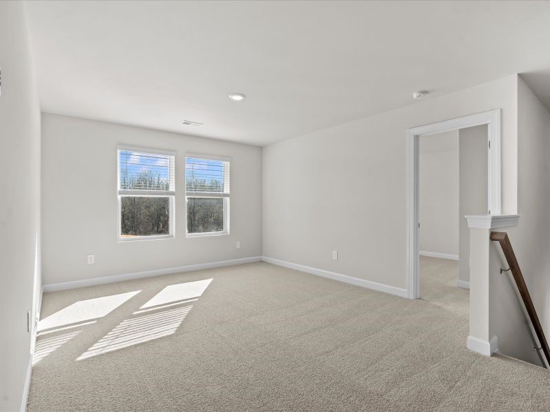 Spacious, unfurnished interior of a new home in The Farm at Wells Creek - Signature Collection, Gray Court (Image 15).