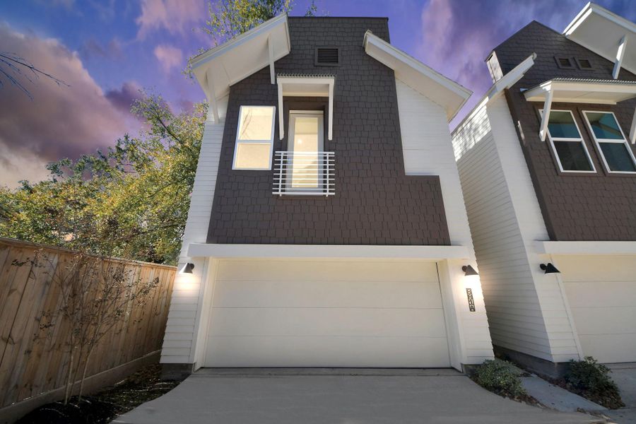 Front exterior of a new home in , Houston, TX, highlighting curb appeal (Image 21).