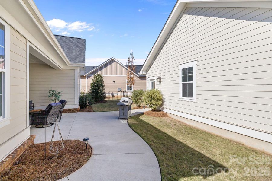 Exterior details and patio area of a home in Riverwalk, Rock Hill (Image 27).
