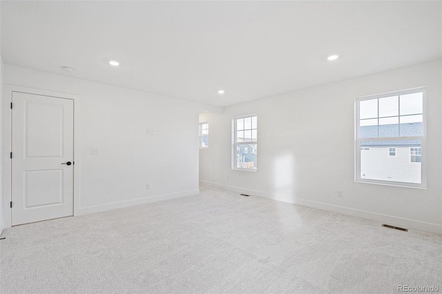 Spacious, unfurnished interior of a new home in Windsong, Thornton (Image 32).