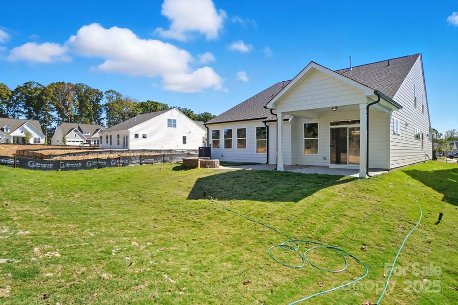Exterior details and patio area of a home in Heritage - 55+ Community, Indian Trail (Image 16).