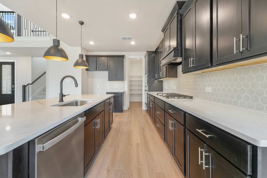 Furnished interior view inside a new home in Union Park, Little Elm (Image 6). Furnished interior view inside a new home in Union Park, Little Elm (Image 6).