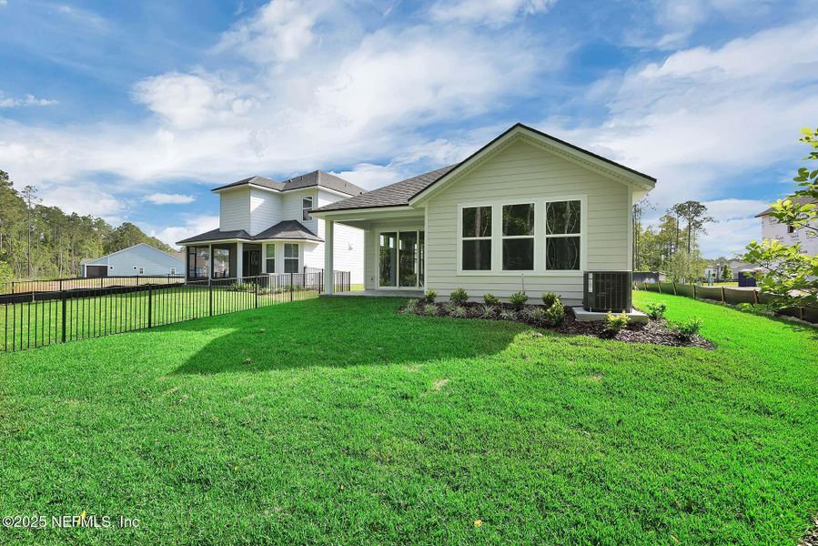 Exterior details and patio area of a home in Reflections at Nocatee, Ponte Vedra (Image 23). Exterior details and patio area of a home in Reflections at Nocatee, Ponte Vedra (Image 23).