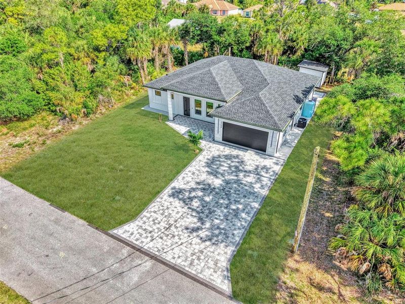 Front exterior of a new home in , North Port, FL, highlighting curb appeal (Image 31).