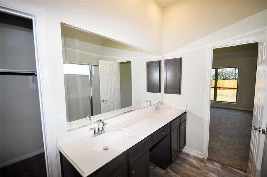 Dual Vanities in the master bedroom and Yes, Medicine Cabinets are standard at Cervelle homes.