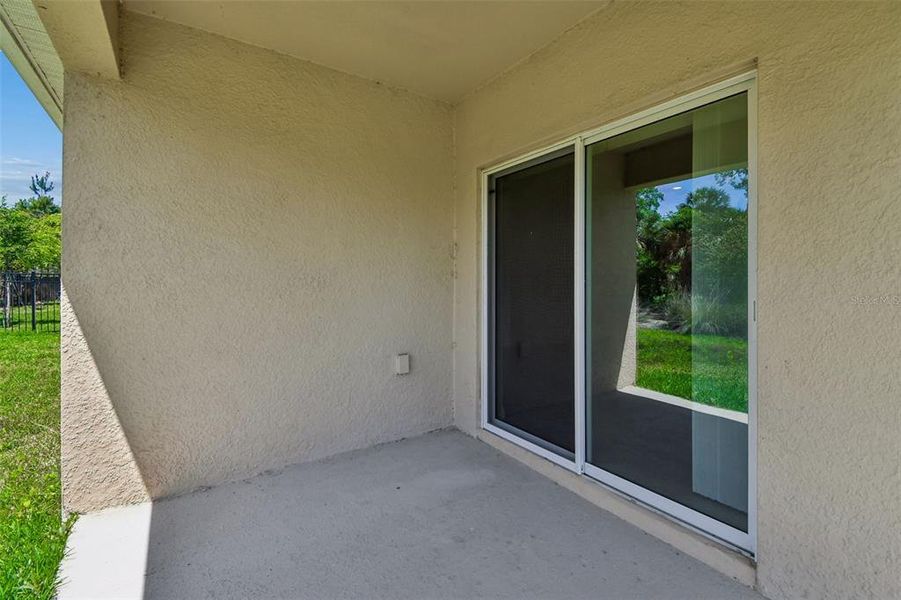 Exterior details and patio area of a home in Riviera Bella, Debary (Image 28).