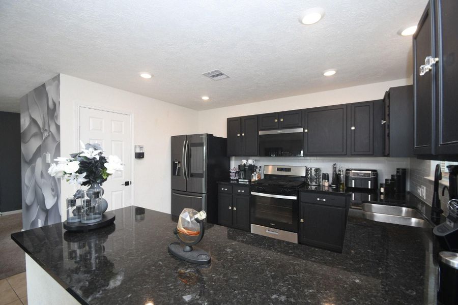 Furnished interior view inside a new home in , Katy (Image 14).