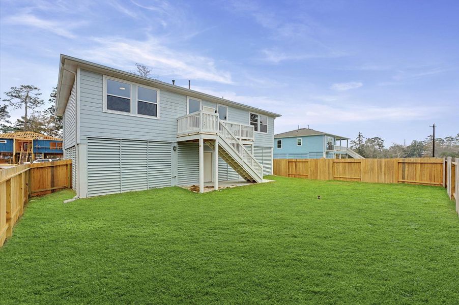 Exterior details and patio area of a home in Peacock Isle, Dickinson (Image 3).