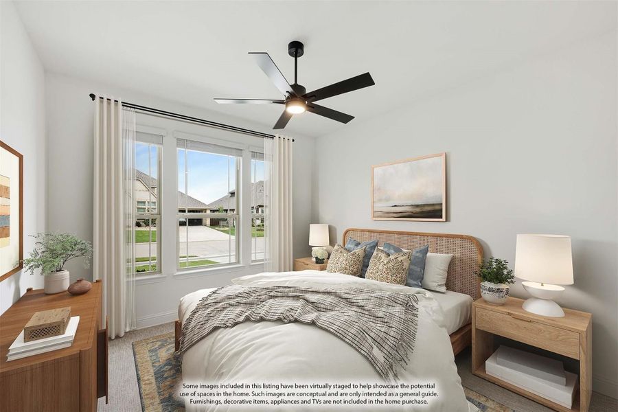 Bedroom with ceiling fan, large windows, wood-framed bed, and neutral decor Bedroom with ceiling fan, large windows, wood-framed bed, and neutral decor