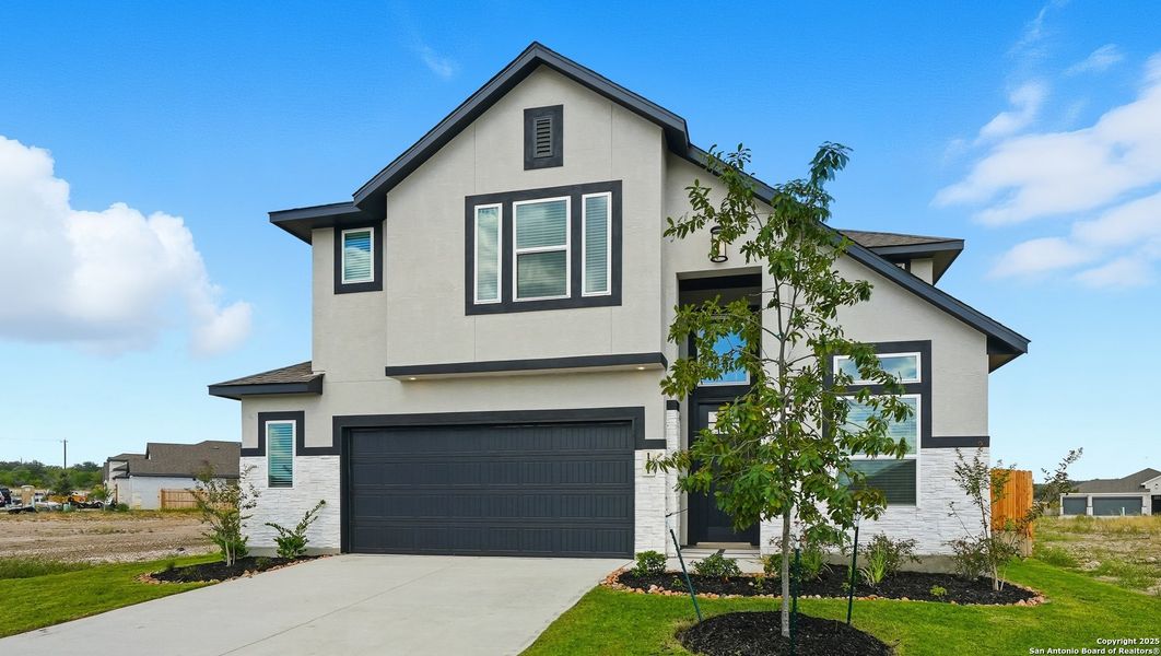 Front exterior of a new home in Alsatian Oaks, Castroville, TX, highlighting curb appeal (Image 27).
