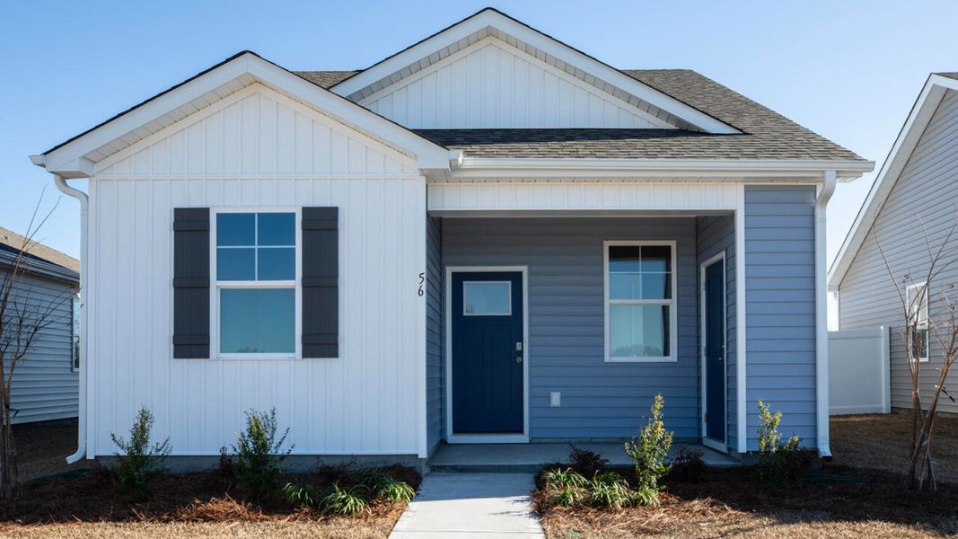 Representative exterior photo of a completed home built from the DELANEY by D.R. Horton in The Cottages at Blake Farm, Wilmington, NC (Image 1). Representative exterior photo of a completed home built from the DELANEY by D.R. Horton in The Cottages at Blake Farm, Wilmington, NC (Image 1).