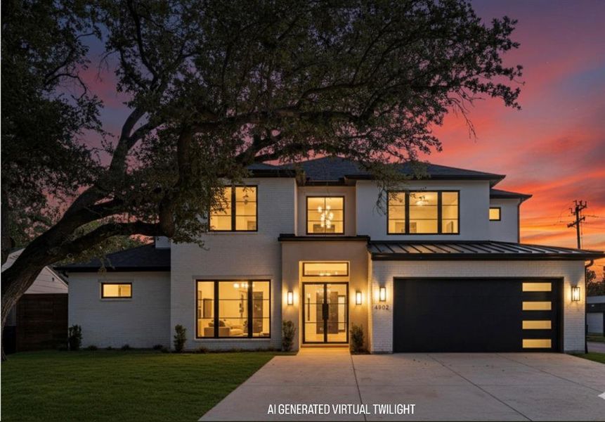 View of front of house featuring brick siding, a standing seam roof, driveway, and a garage View of front of house featuring brick siding, a standing seam roof, driveway, and a garage