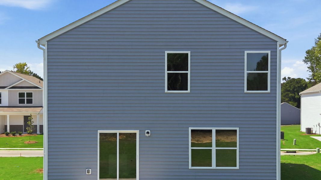 Exterior details and patio area of a home in Hobbs Farm, Ayden (Image 22).