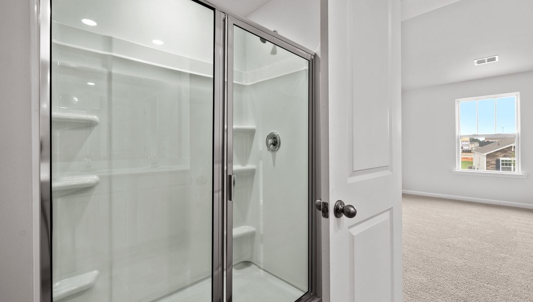 Representative furnished interior of a home built from the Biltmore by D.R. Horton in Woodglen, Piedmont (Image 11).