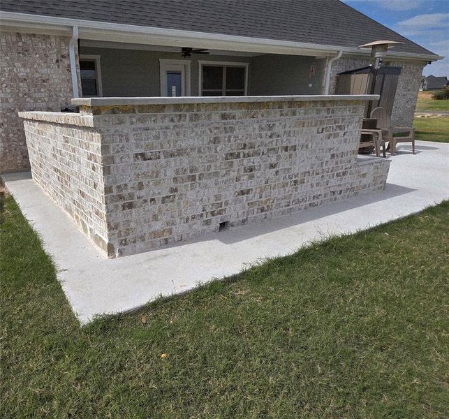 The backside of the outdoor kitchen