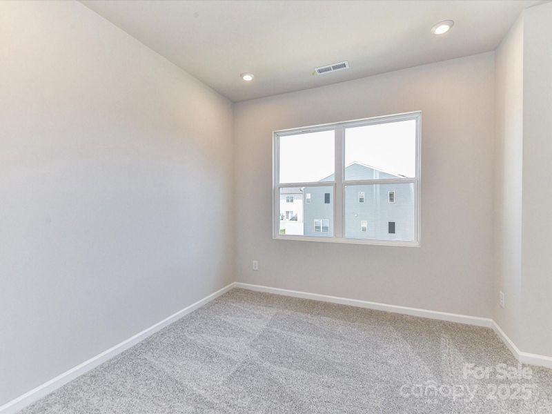 Secondary Bedroom Featuring Energy Efficient Window.