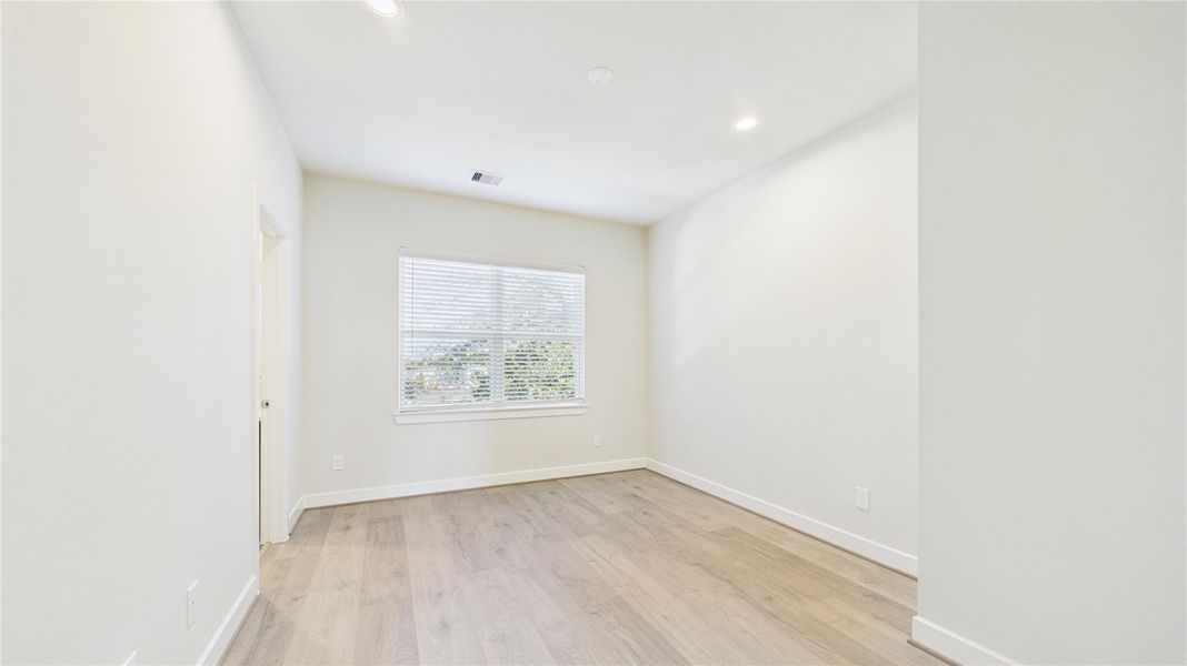 Large secondary bedroom with walk-in closet and private bath. Large secondary bedroom with walk-in closet and private bath.