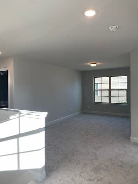 Spacious, unfurnished interior of a new home in Royal Pines, Trinity (Image 22).