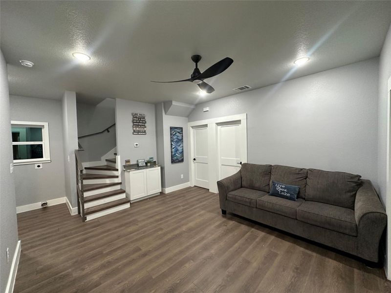 Living room and first level with covered porch , sliding doors and recessed lighting. Living room and first level with covered porch , sliding doors and recessed lighting.