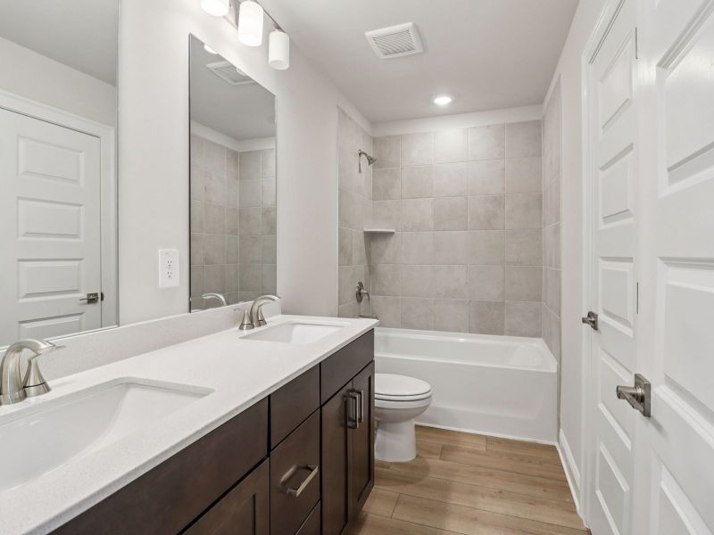 Furnished interior view inside a new home in Martin Springs - Highland Series, Lawrenceville (Image 10).