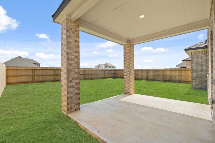 The covered patio is generously sized, providing ample space for various outdoor activities. The covered patio is generously sized, providing ample space for various outdoor activities.