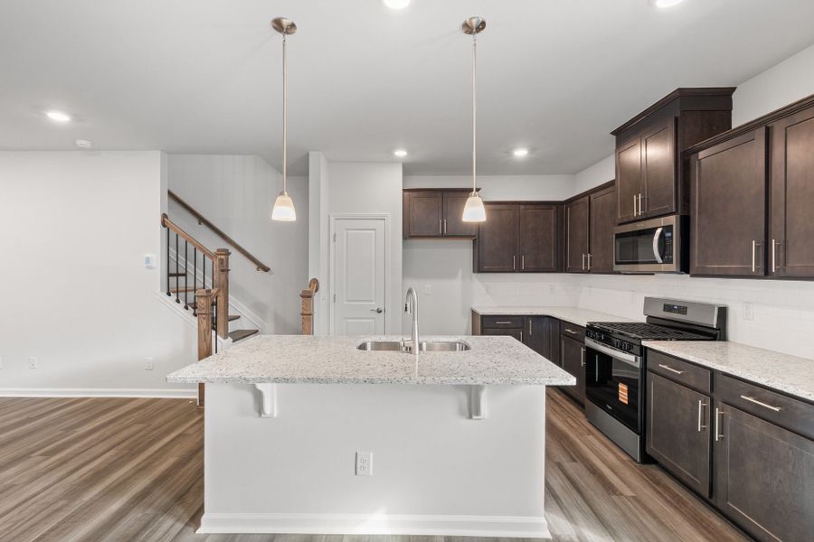 Furnished interior view inside a new home in Poets Walk, Whitsett (Image 10).