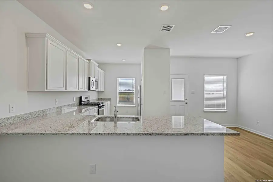 Furnished interior view inside a new home in , San Antonio (Image 7).