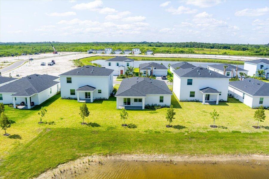 Front exterior of a new home in Seagrove: The Indies, Fort Pierce, FL, highlighting curb appeal (Image 21).