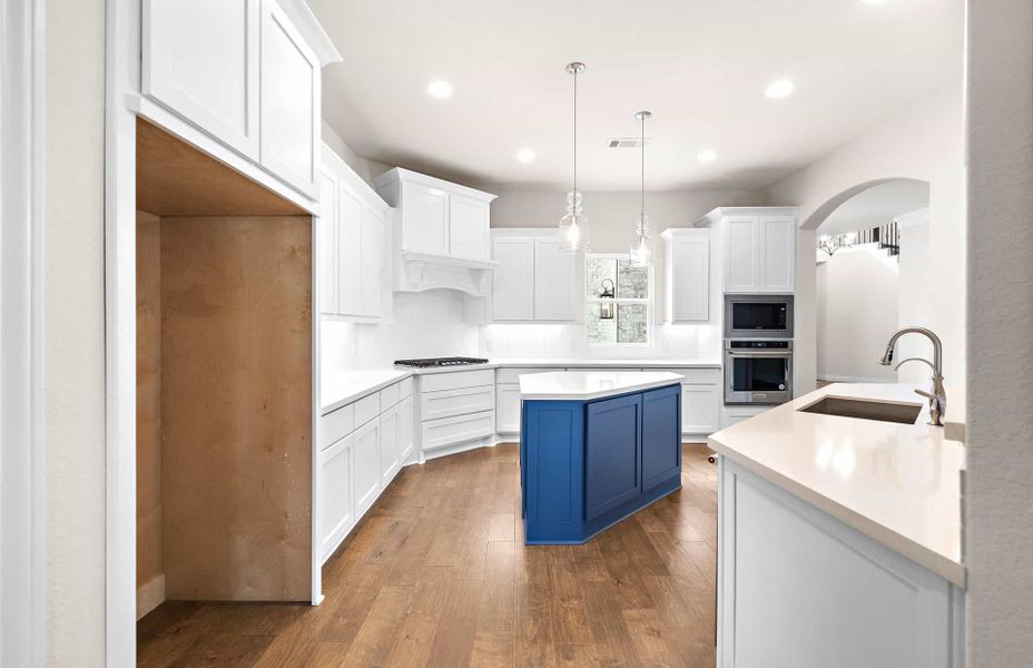 Representative furnished interior of a home built from the 4094 by Ravenna Homes in Artavia 70′, Conroe (Image 11).