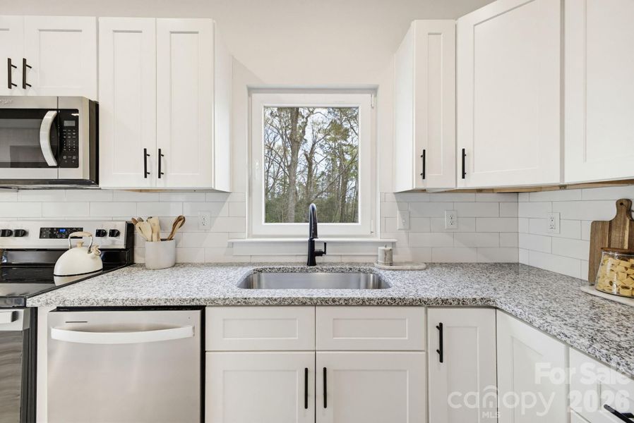 Furnished interior view inside a new home in , Hickory (Image 13).