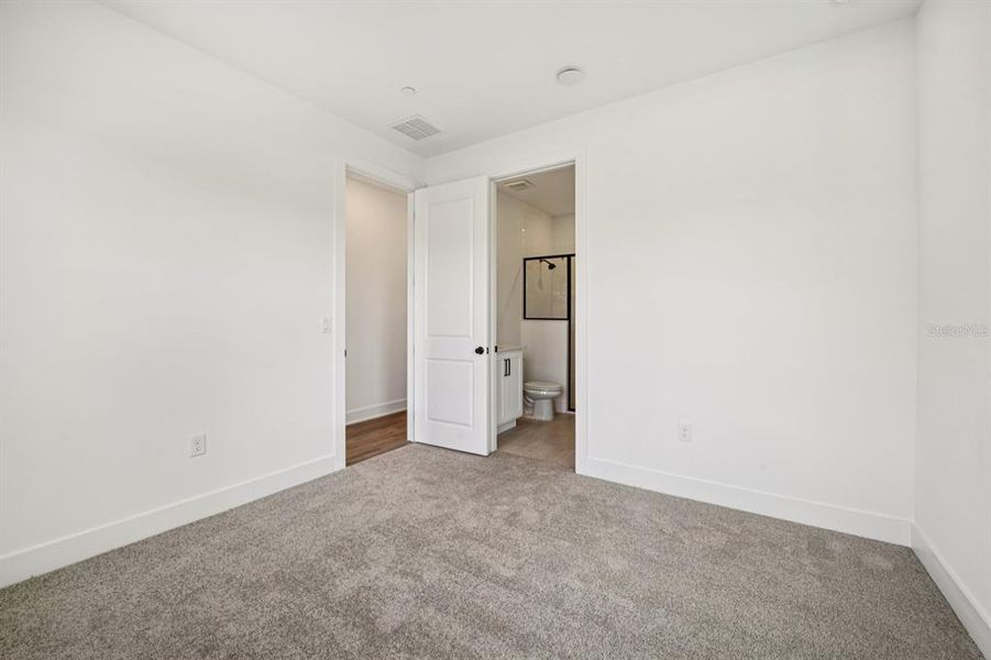 Spacious, unfurnished interior of a new home in Parkview at Hamlin, Winter Garden (Image 22).