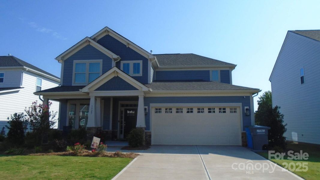 Front exterior of a new home in , Belmont, NC, highlighting curb appeal (Image 1). Front exterior of a new home in , Belmont, NC, highlighting curb appeal (Image 1).