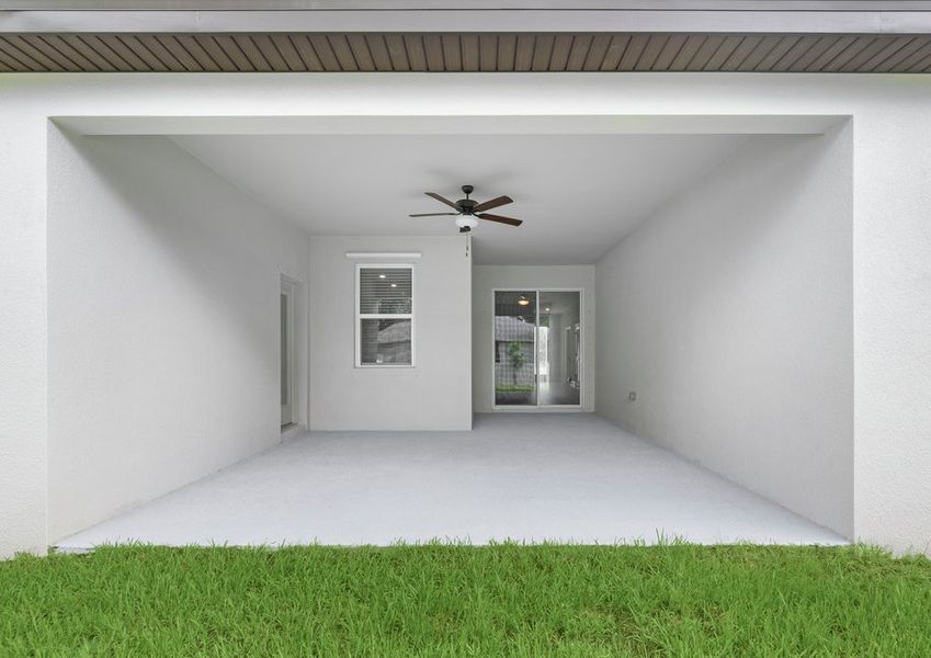 The covered back patio is the perfect place to enjoy outdoor living!