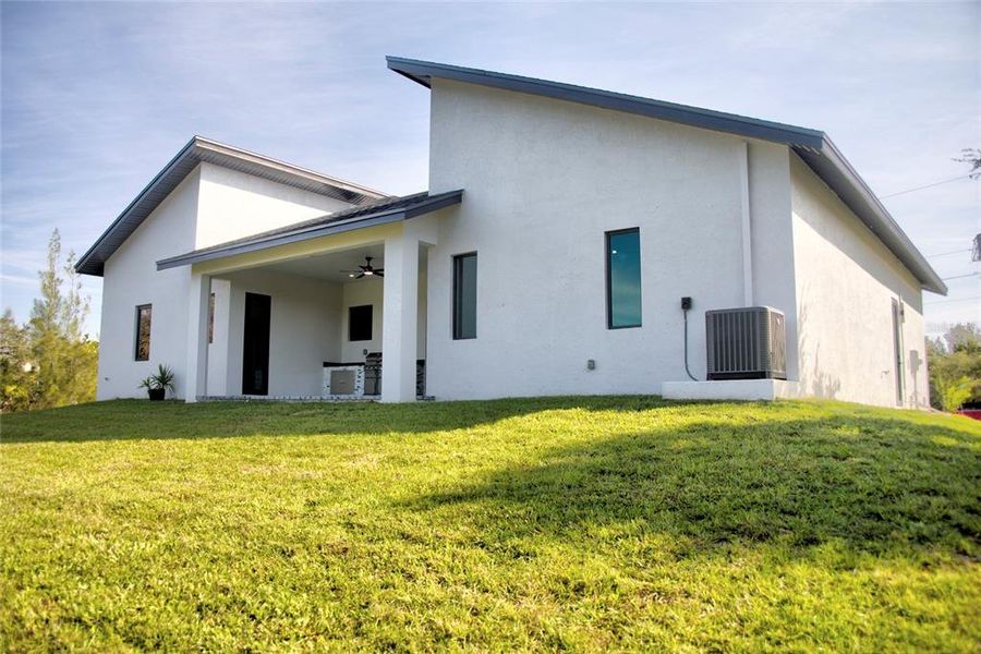Exterior details and patio area of a home in , Port Charlotte (Image 31). Exterior details and patio area of a home in , Port Charlotte (Image 31).