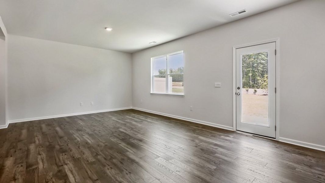 Representative unfurnished interior of a home built from the DANIEL by D.R. Horton in The Townes Park, Apex (Image 13). Representative unfurnished interior of a home built from the DANIEL by D.R. Horton in The Townes Park, Apex (Image 13).