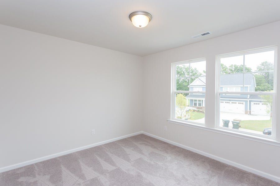 Representative unfurnished interior of a home built from the The Sycamore by Chesapeake Homes in Traditions at Carolina Forest, Myrtle Beach (Image 24).