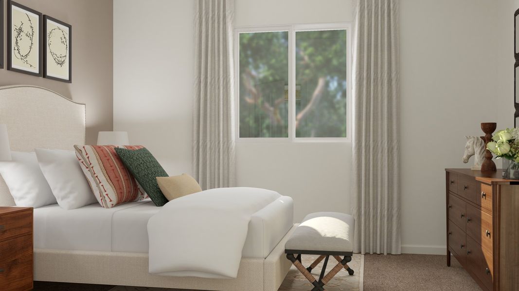 A room with a couch and a table.