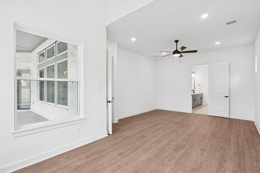 Another view of Master bedroom from sitting room. Note window looking out to patio.