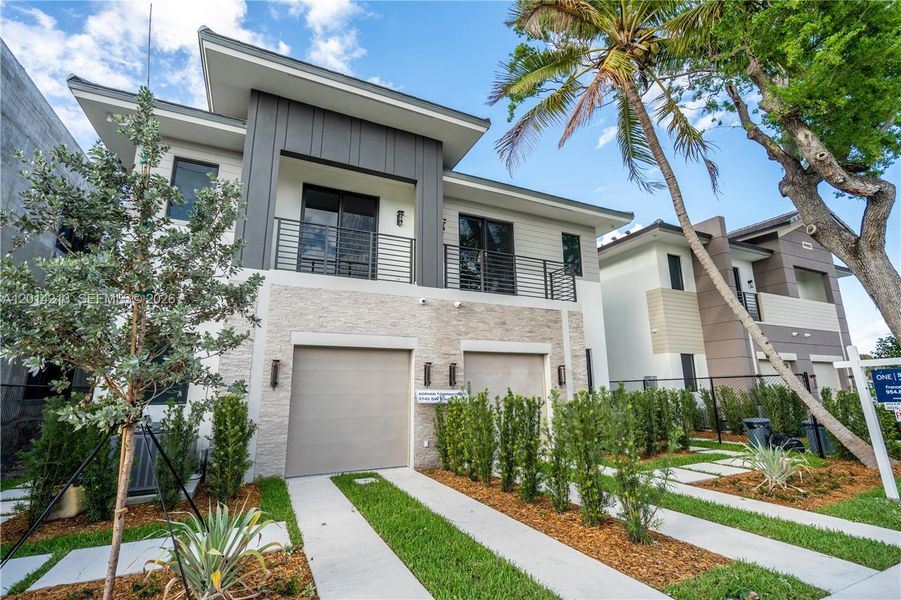 Front exterior of a new home in , Miami, FL, highlighting curb appeal (Image 26). Front exterior of a new home in , Miami, FL, highlighting curb appeal (Image 26).