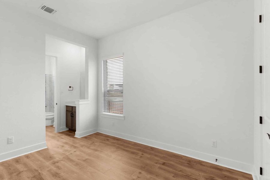 Spacious, unfurnished interior of a new home in The Grove at Blackhawk, Pflugerville (Image 31).